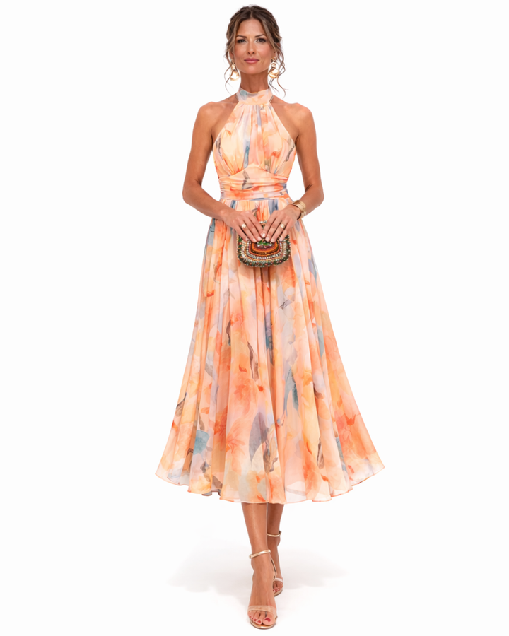 Dolores | Vestido largo fluido con cuello halter y estampado artístico